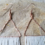 hand hammered copper triangle earring close up
