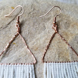 hand hammered copper triangle earring close up